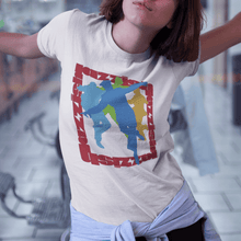 Load image into Gallery viewer, girl wearing a white t-shirt with a print of four dance silhouettes that are placed inside a square made by the word jazz ish on all the 4 sides