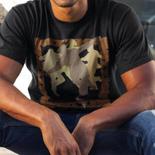 Load image into Gallery viewer, guy-sitting-and-wearing-black-t-shirt-with-with-dancers-and-text-on-the-front