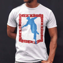 Load image into Gallery viewer, man standing outsideis home wearing a jazz dance t-shirt with red texted square and blue silhouette dancer in the centre on the front