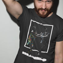 Load image into Gallery viewer, red haired man wearing a mambo4 tshirt in a studio