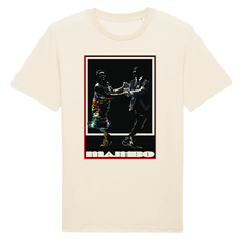 Load image into Gallery viewer, natural-color-t-shirt-layed-flat-a-print-on-the-front-with-a-couple-dancing-and-at-the-bottom-is-text-it-says-mambo
