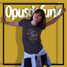 Load image into Gallery viewer, girl-wearing-black-t-shirt-with-graphic-on-the-front-for-a-vintage-camera-and-text
