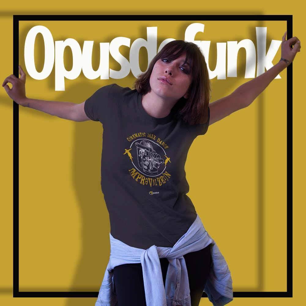 girl-wearing-black-t-shirt-with-graphic-on-the-front-for-a-vintage-camera-and-text