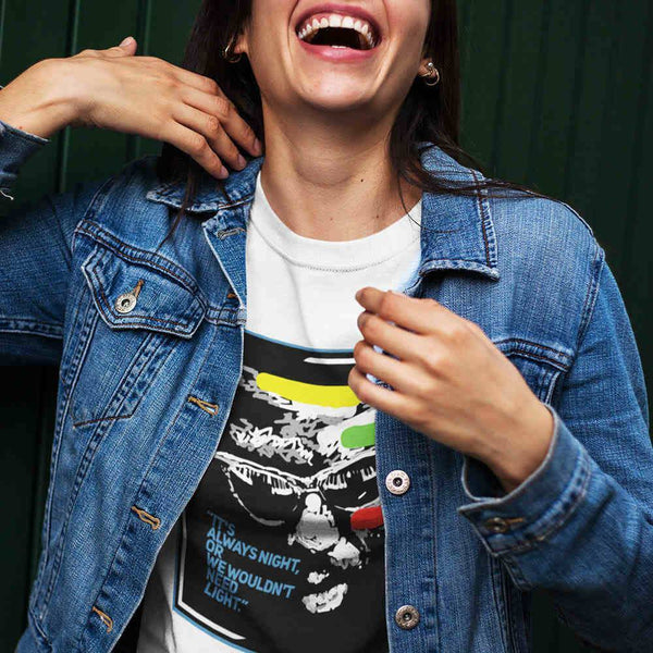 happy girl wearing a monk always t-shirt and a denim jacket