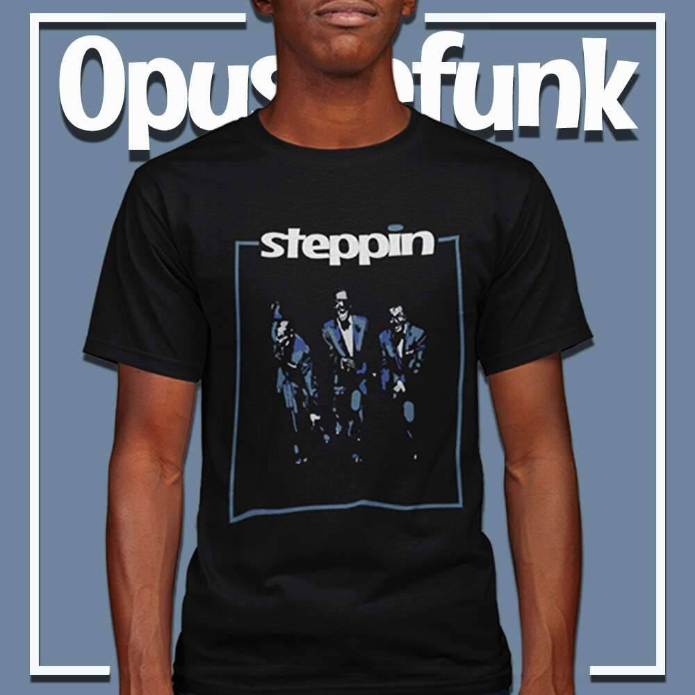 guy-wearing-a-black-t-shirt-with-three-dancers-on-the-front