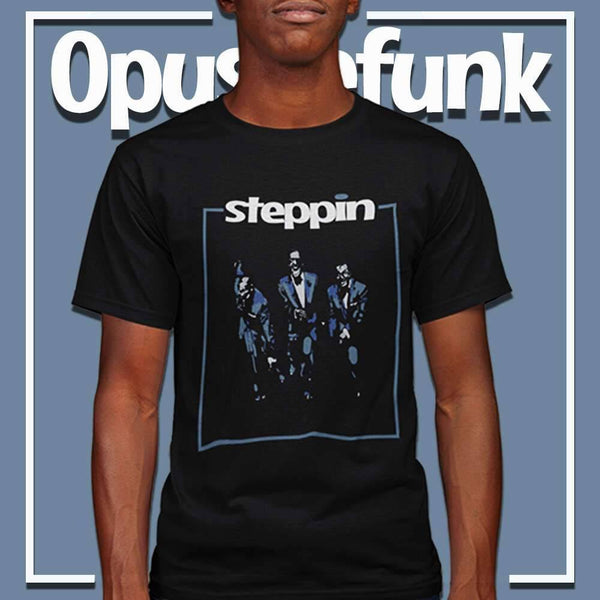 guy-wearing-a-black-t-shirt-with-three-dancers-on-the-front