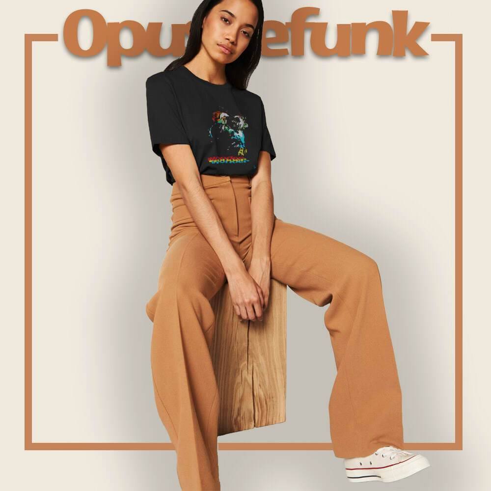girl-sitting-wearing-a-black-t-shirt-with-a-face-and-text-on-the-front